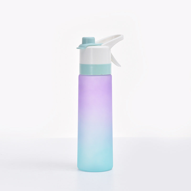 Gradient-colored water bottle with a white cap on a light gray background