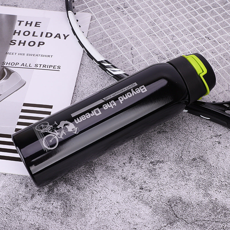 Black and green lighter with 'Beyond the Dream' branding on a textured surface.