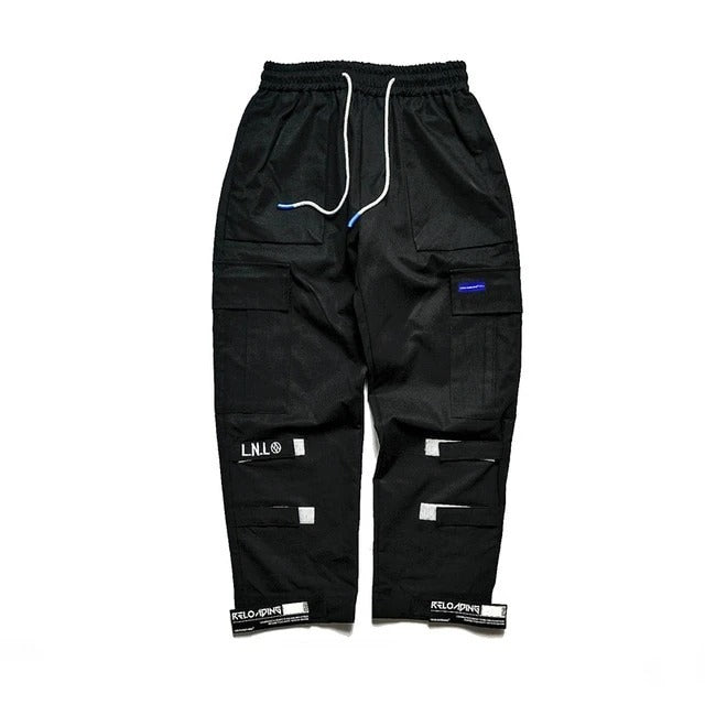 Black cargo pants with multiple pockets and brand logos on a white background