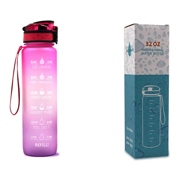 Pink water bottle with time markers and its packaging on a white background