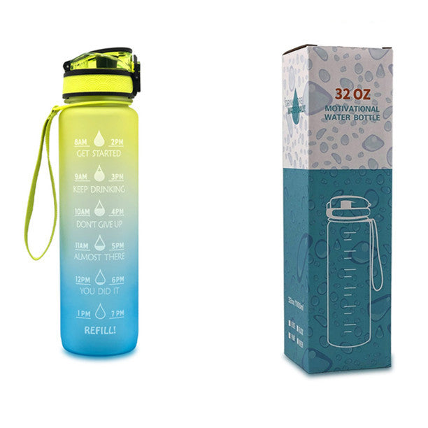 Gradient water bottle with motivational markings and packaging on a white background