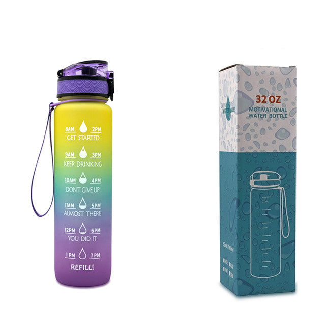 Motivational water bottle with gradient design and packaging on a white background