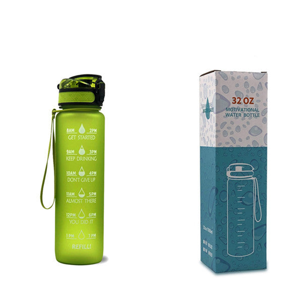 Green water bottle with motivational text and its packaging on a white background