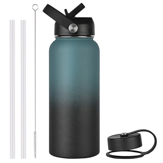 Gradient blue to black water bottle with black lid and straw on a white background